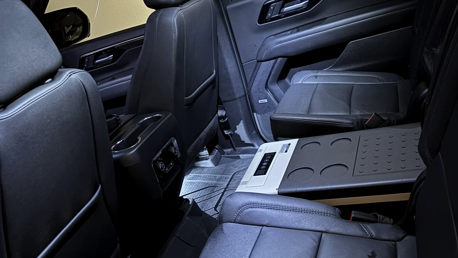 Black leather passenger cabin inside a BRE Limo vehicle